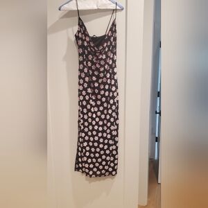 Black floral dress with spaghetti straps and cowl neck